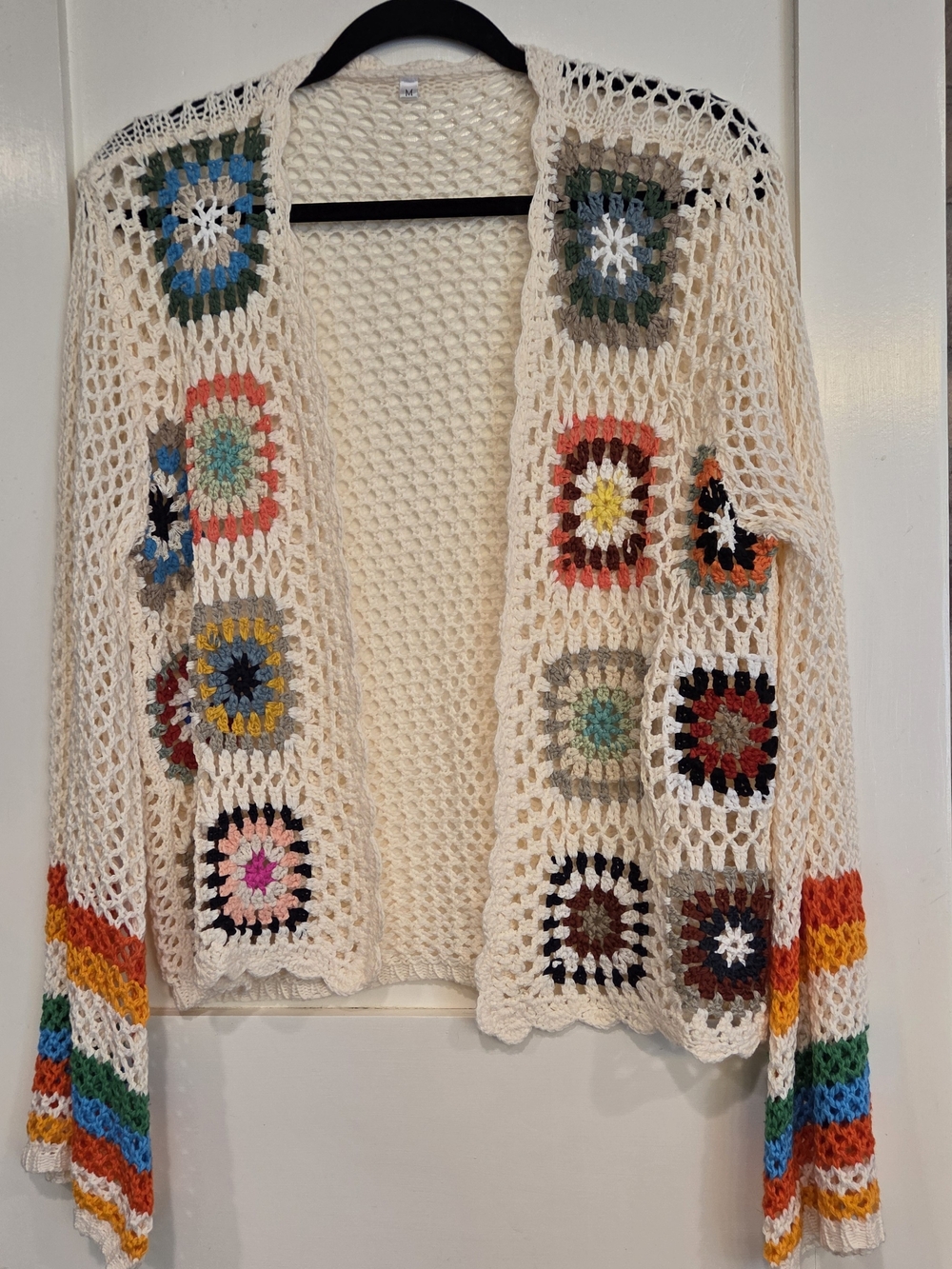 Cream Crochet Open-Front Cardigan with Multicolor Granny Square Accents. #boho